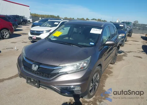 2016 Honda Cr-V Touring z USA, uszkodzony, nr VIN 5J6RM3H92GL031415